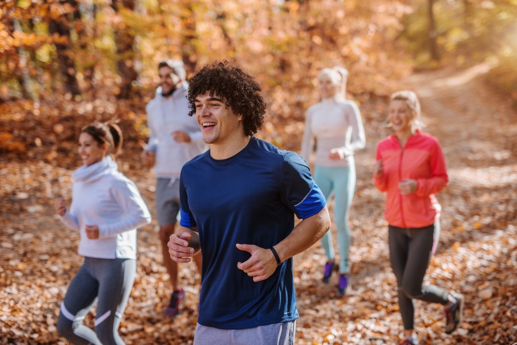 group of runners laughing together