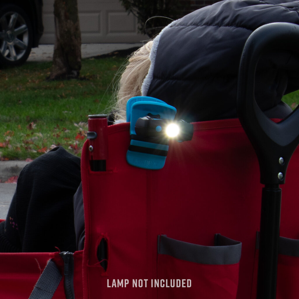 Universal Clip clipped onto a child's wagon.