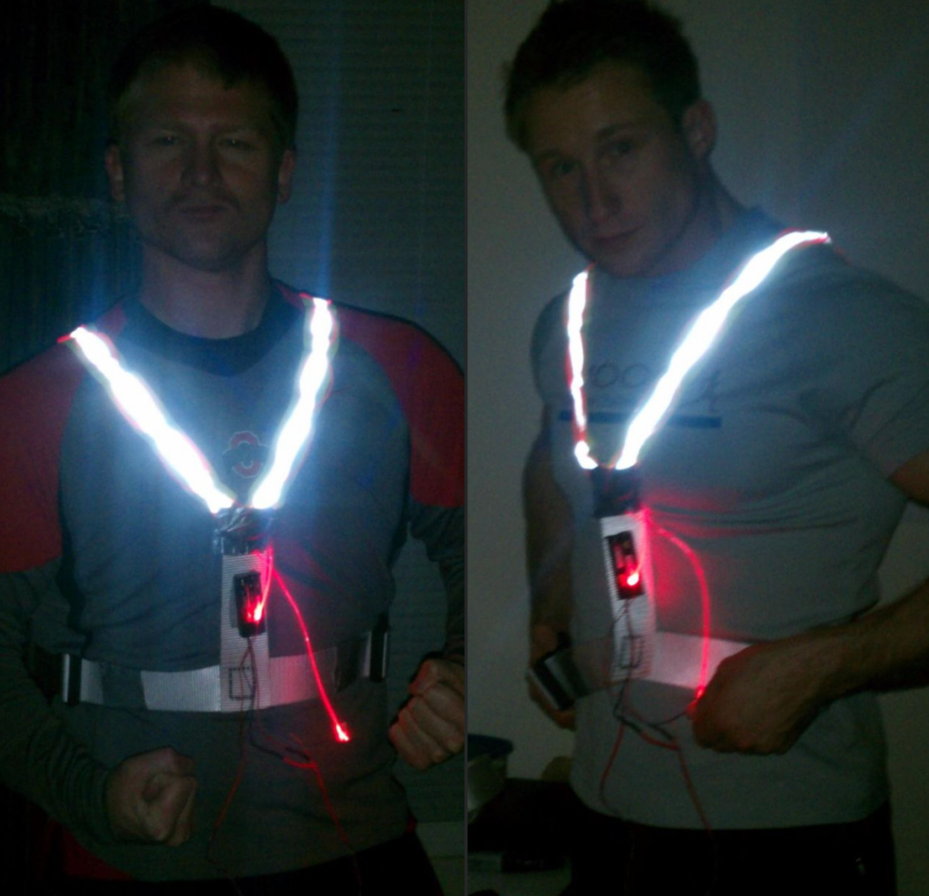Tom and Simon showing off their homemade light up vests