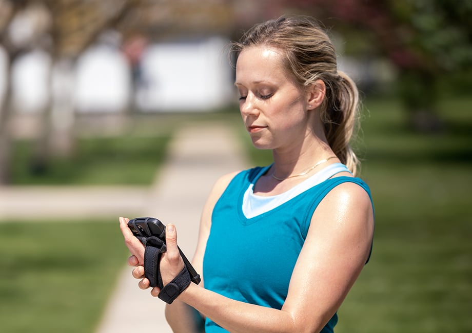 Woman looking at phone using Phone Holder.