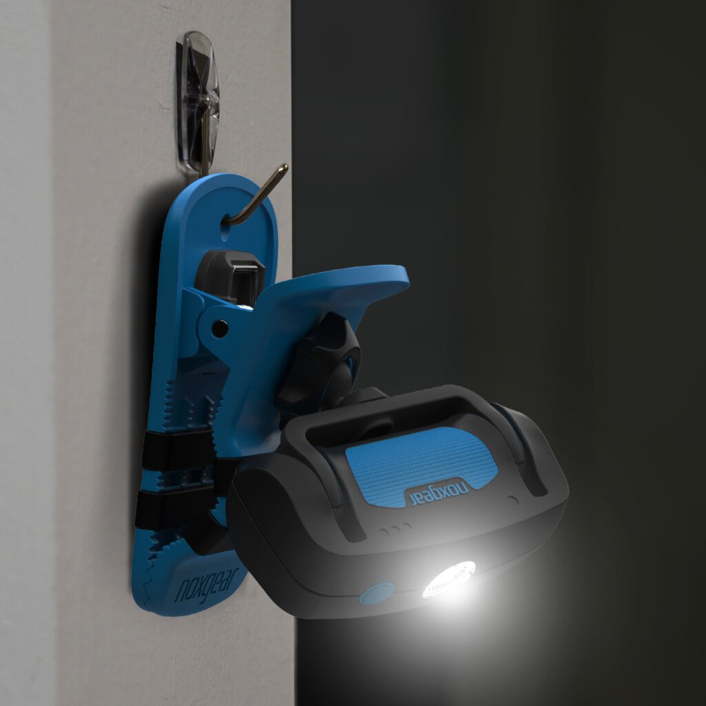 Clip Anywhere Light hanging on a hook with light shining down.